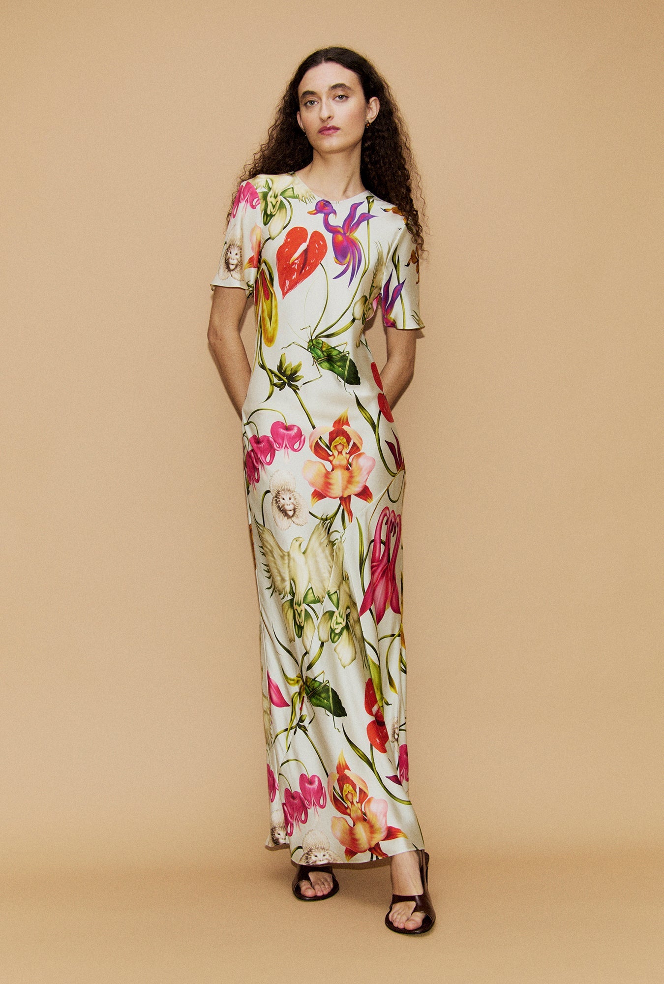 Image of a model wearing Tops. Product name - Short Sleeve Bias Dress Wonderland in Wonderland colour by brand - Silk Laundry