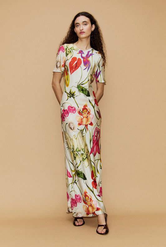 Image of a model wearing Tops. Product name - Short Sleeve Bias Dress Wonderland in Wonderland colour by brand - Silk Laundry