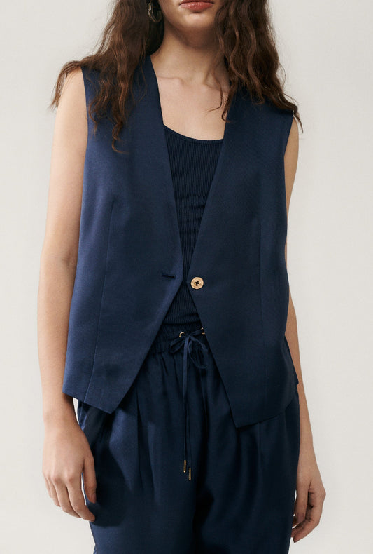 Image of a model wearing Tops. Productname: Silk Laundry Twill Slouch Vest in Midnight colour by brand - Silk Laundry