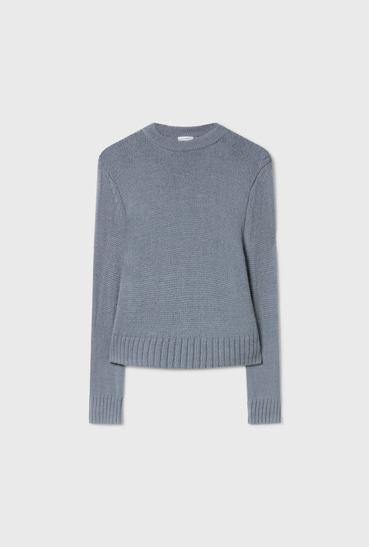 Image of a model wearing Outerwear. Product name - Alpaca Cropped Crewneck Storm in Storm colour by brand - Silk Laundry