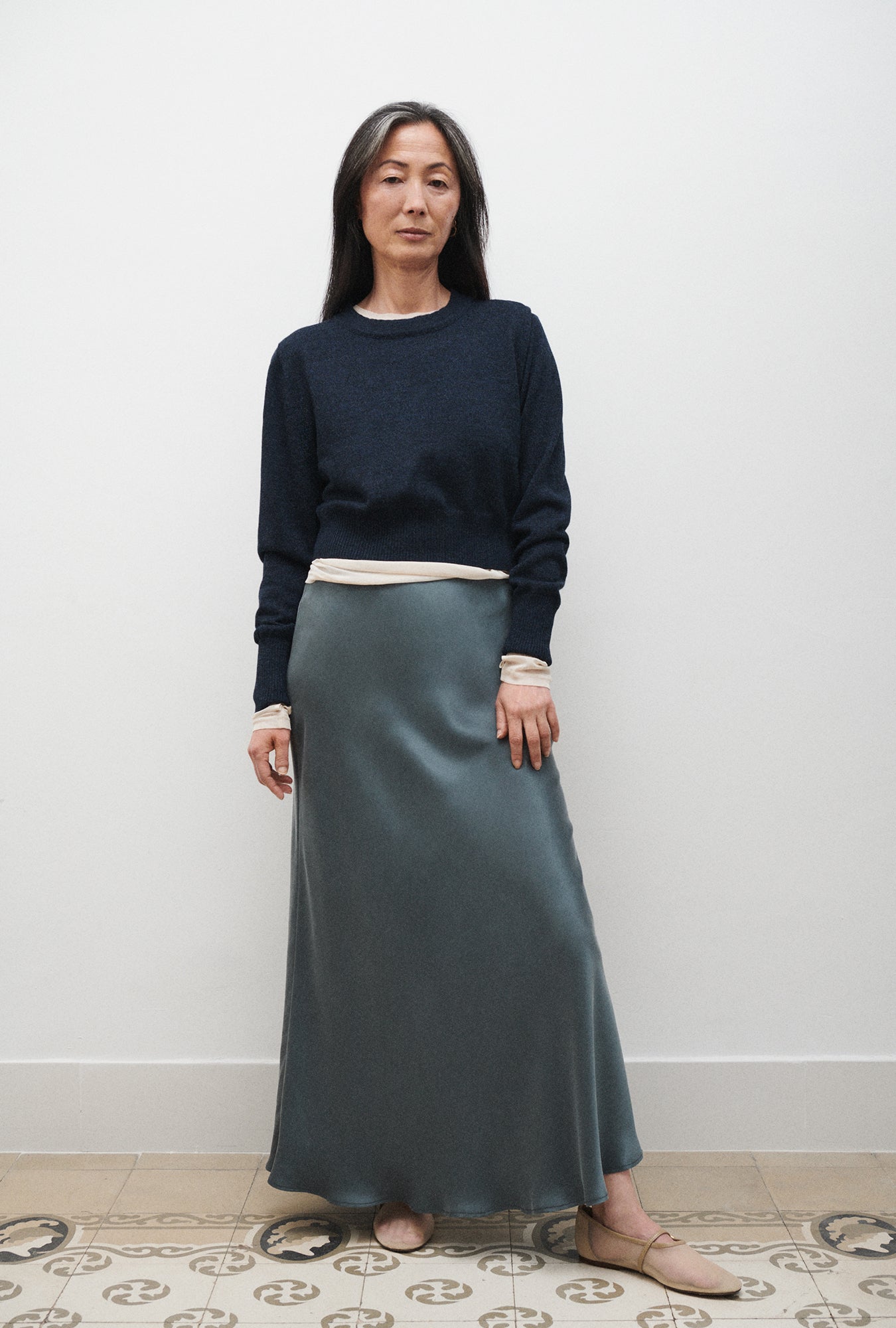 Image of a model wearing Outerwear. Product name - Cropped Crewneck Azul Melange in Azul Melange colour by brand - Silk Laundry