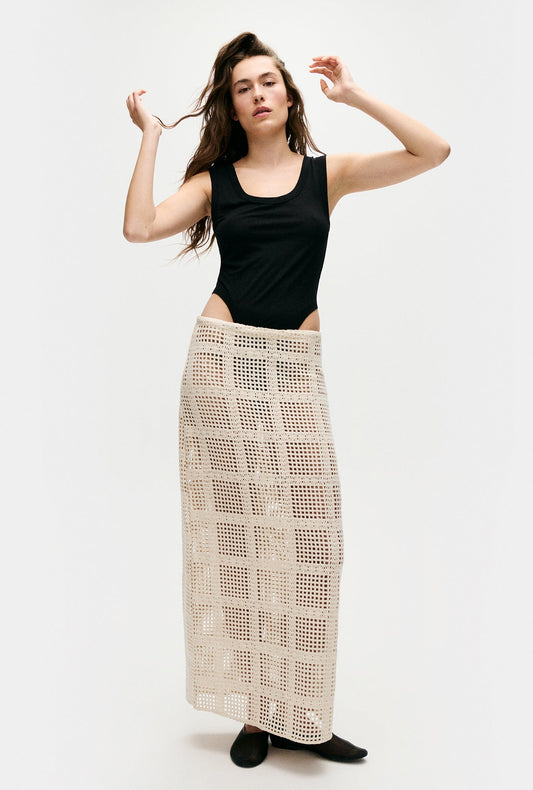 Image of a model wearing Skirts. Productname: Cotton Grid Long Skirt Natural in Natural colour by brand - Silk Laundry