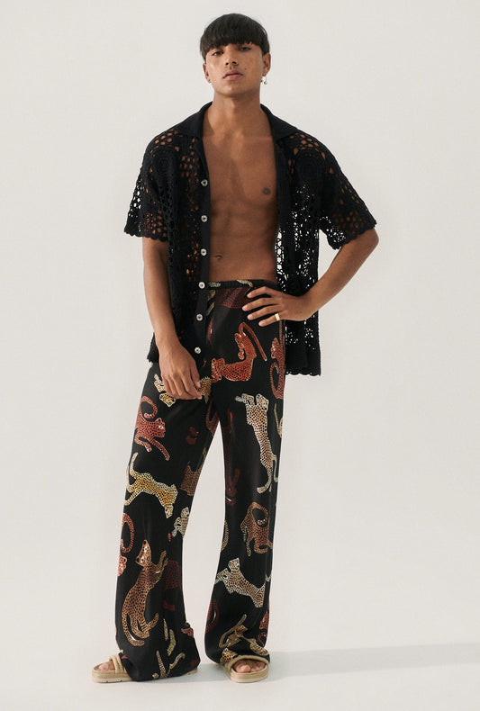 Image of a model wearing Pants. Productname: Bias Cut Pants Jaguars Black in Jaguars Black colour by brand - Silk Laundry