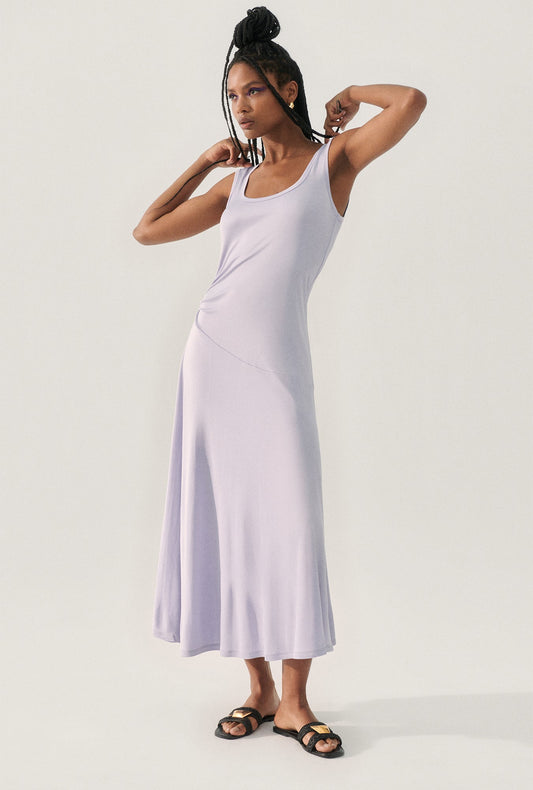 Image of a model wearing Tops. Product name - Jersey Sleeveless Dress Lavender in Lavender colour by brand - Silk Laundry