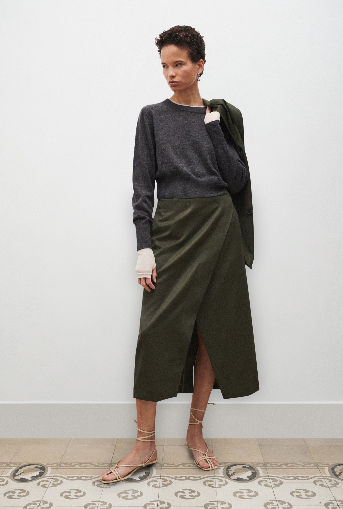 Image of a model wearing Outerwear. Product name - Cropped Crewneck Granite Melange in Granite Melange colour by brand - Silk Laundry