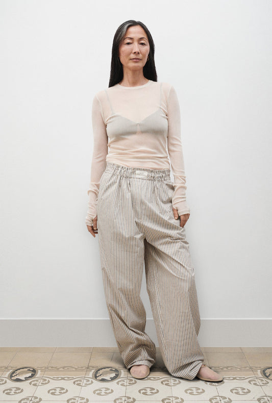 Image of a model wearing Tops. Productname: Silk Laundry MESH LONG SLEEVE TOP in Hazelnut colour by brand - Silk Laundry