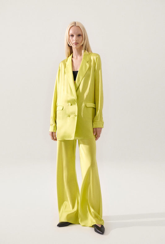 Image of a model wearing Outerwear. Product name - Relaxed Blazer Absinthe in Absinthe colour by brand - Silk Laundry