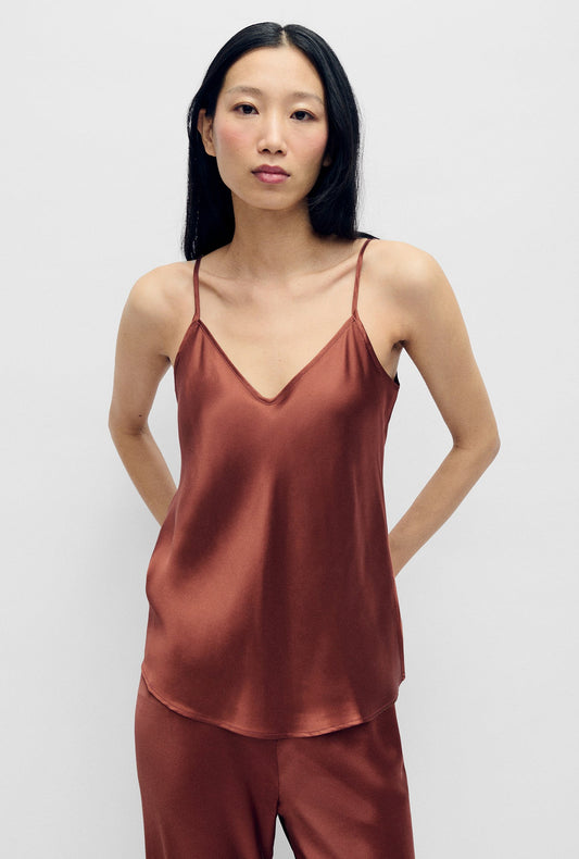Image of a model wearing Tops. Productname: Bias Cut Cami Canyon in Canyon colour by brand - Silk Laundry