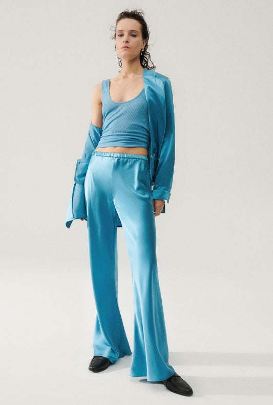 Image of a model wearing Pants. Productname: Bias Cut Pants Lake in Lake colour by brand - Silk Laundry