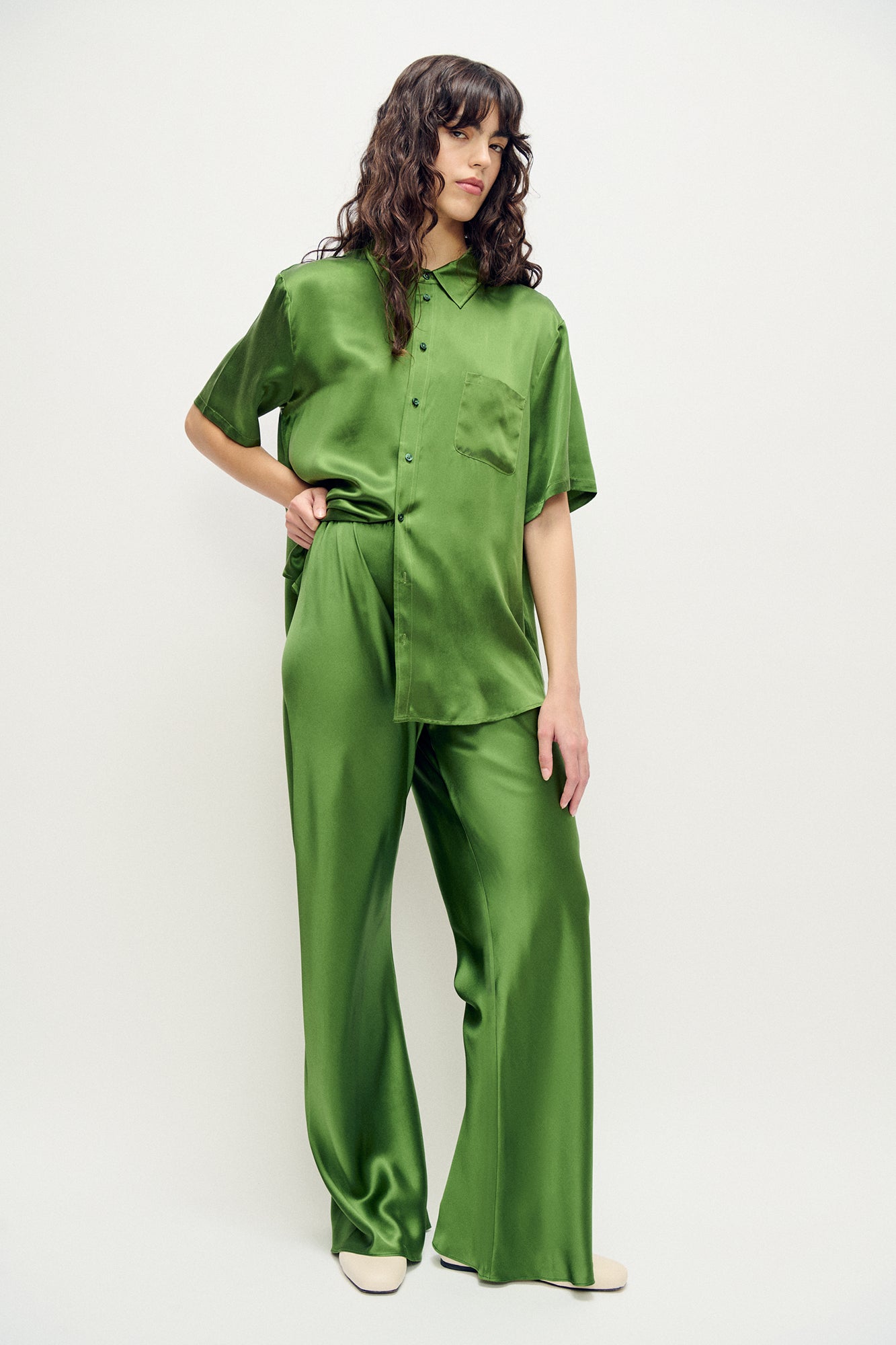 Image of a model wearing Pants. Product name - Bias Cut Pants Fields in Fields colour by brand - Silk Laundry