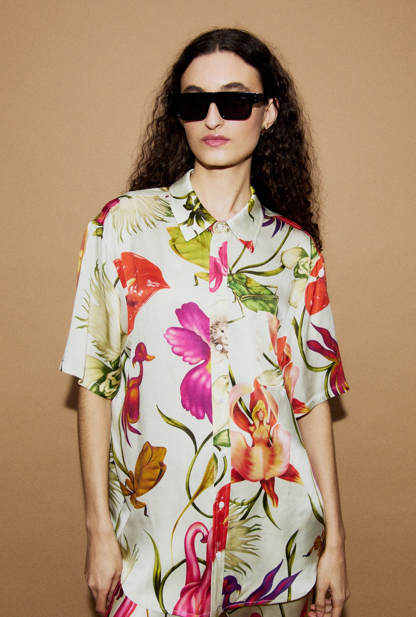 Image of a model wearing Tops. Product name - Short Sleeve Boyfriend Shirt Wonderland in Wonderland colour by brand - Silk Laundry