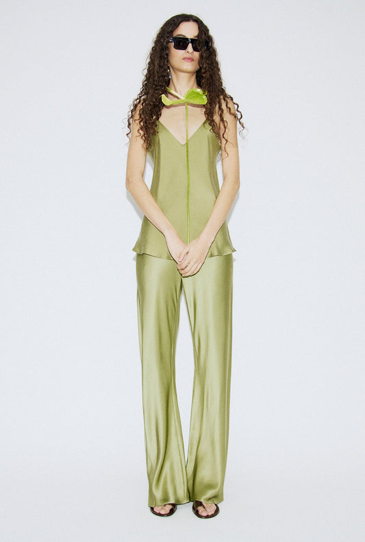 Image of a model wearing Tops. Productname: Bias Cut Cami Sage in Sage colour by brand - Silk Laundry