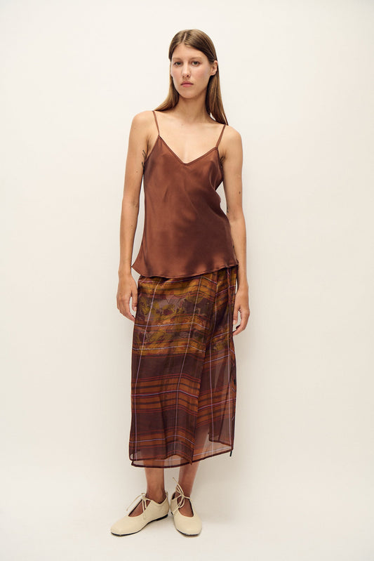 Image of a model wearing Tops. Productname: Bias Cut Cami Root in Root colour by brand - Silk Laundry