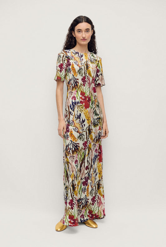 Image of a model wearing Tops. Productname: Silk Laundry Short Sleeve Bias Dress in Planktonic colour by brand - Silk Laundry