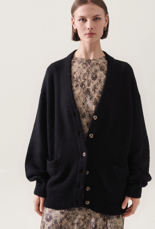 Image of a model wearing Tops. Productname: Silk Laundry ALPACA SLOUCH CARDIGAN in Black colour by brand - Silk Laundry