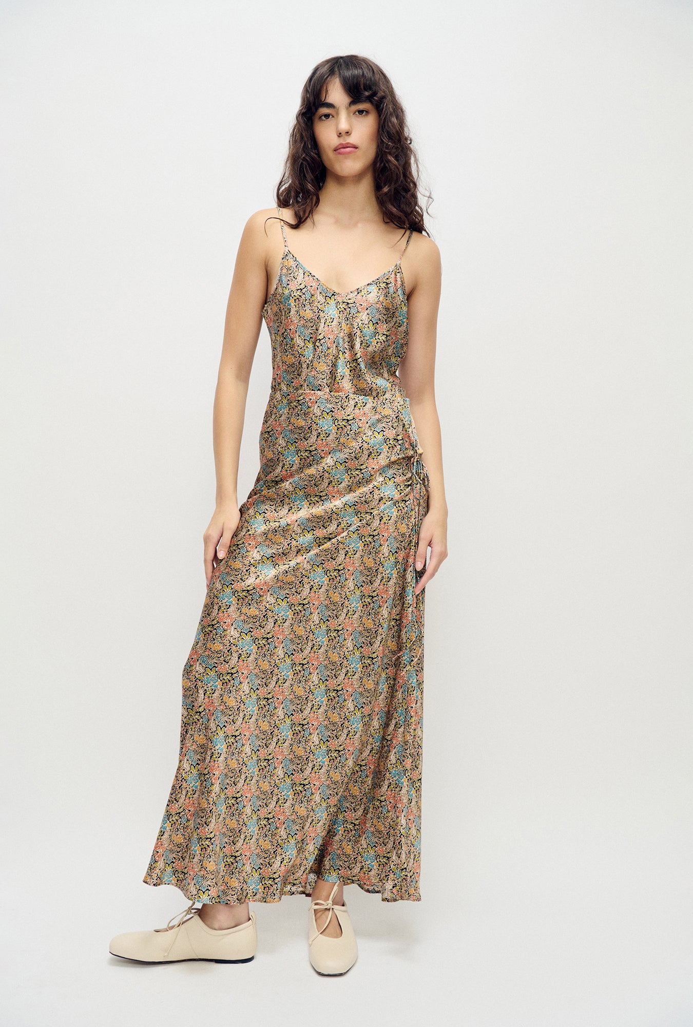 Image of a model wearing Skirts. Product name - Long Bias Cut Skirt Sugar Floral in Sugar Floral colour by brand - Silk Laundry