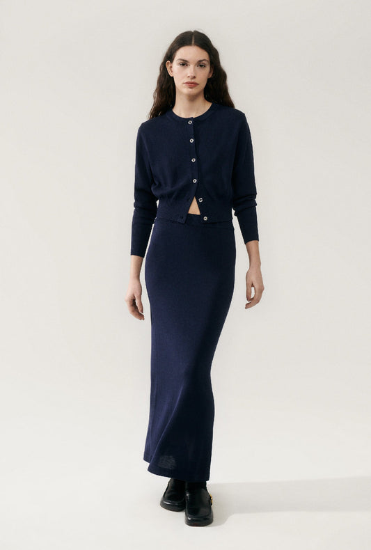 Image of a model wearing Outerwear. Productname: Cropped Cardigan Midnight in Midnight colour by brand - Silk Laundry