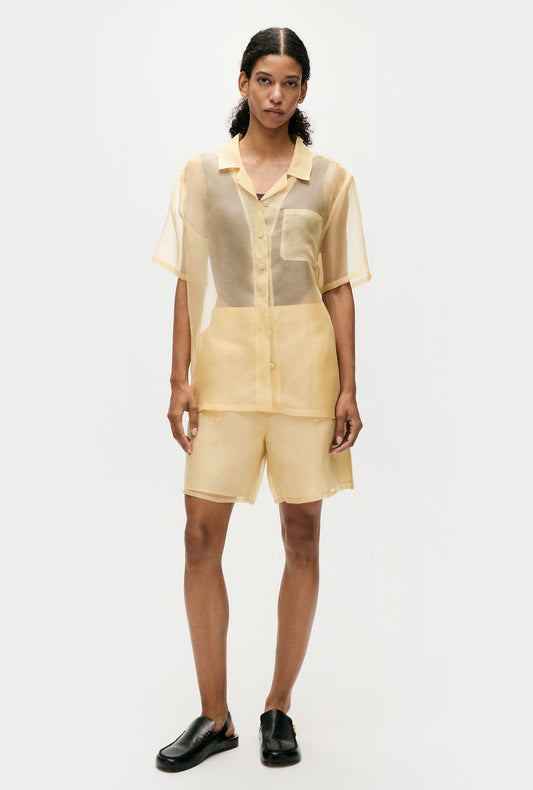 Image of a model wearing Shorts. Product name - Organza Boxer Shorts Beige in Beige colour by brand - Silk Laundry