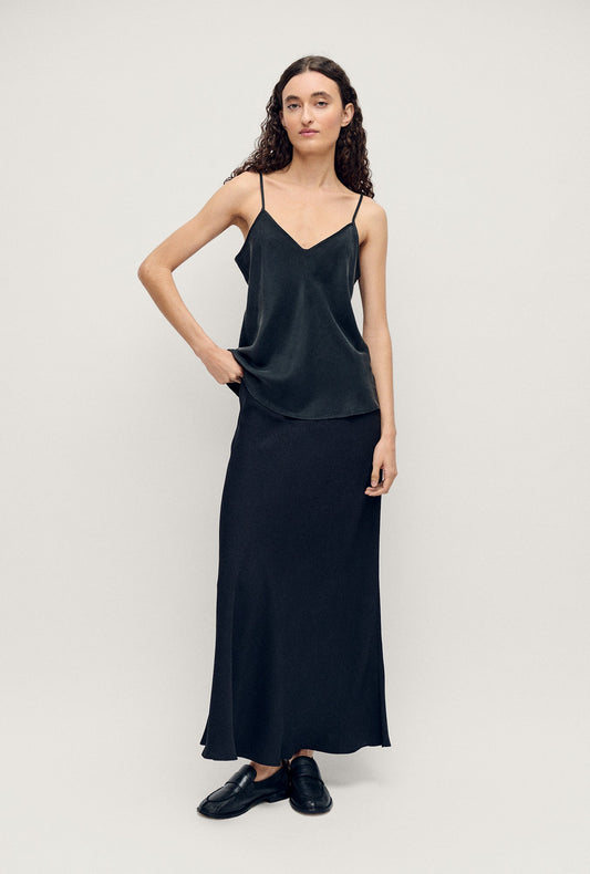 Image of a model wearing Skirts. Productname: Silk Laundry Long Bias Cut Skirt in Coral Jacquard colour by brand - Silk Laundry