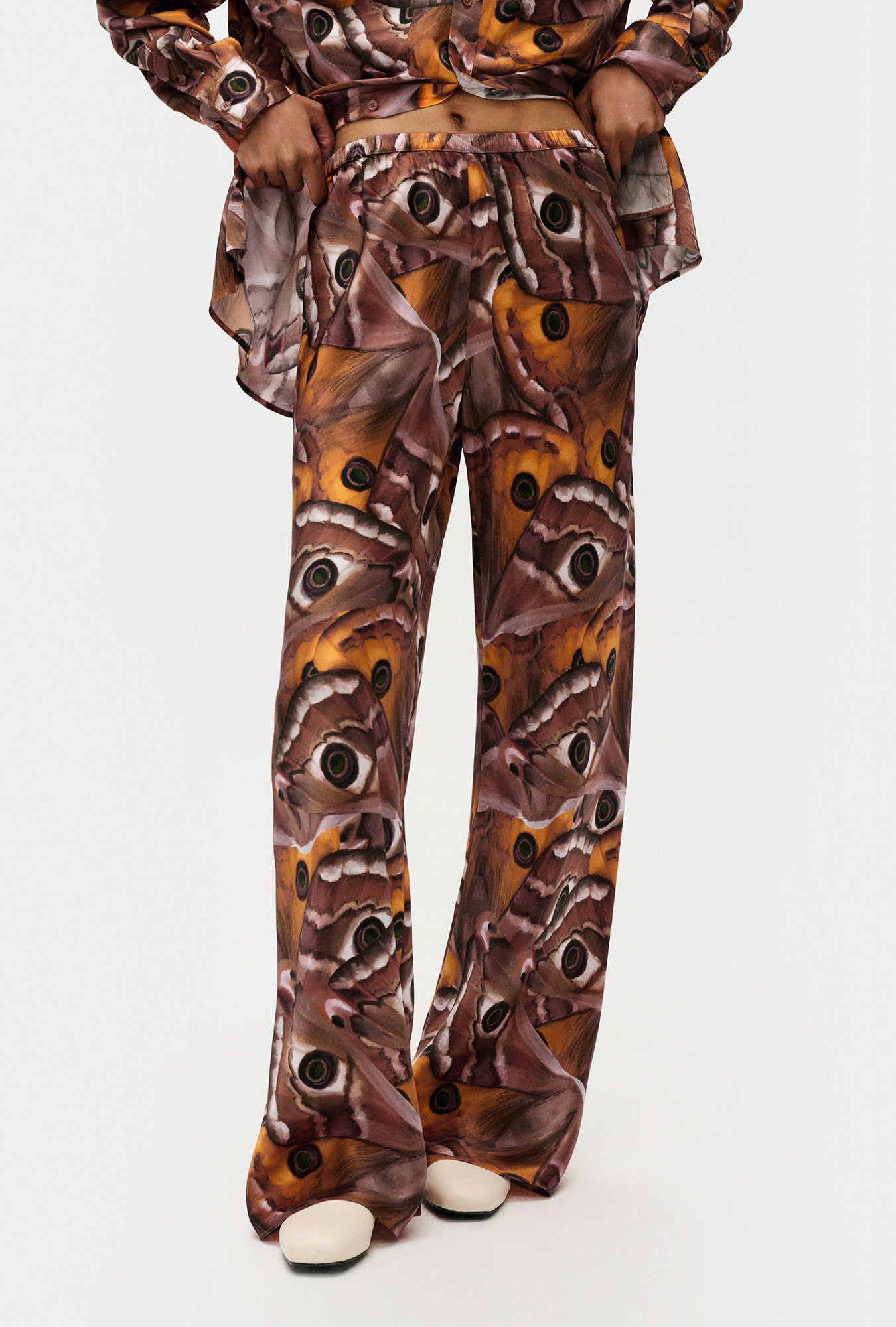 Image of a model wearing Pants. Product name - Bias Cut Pants Wingspan in Wingspan colour by brand - Silk Laundry