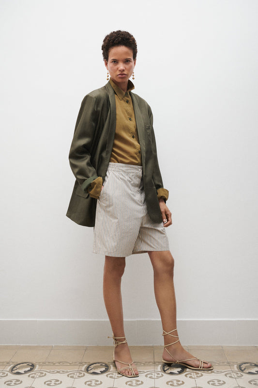 Image of a model wearing Shorts. Product name - Cotton Boxers Slate Stripe in Slate Stripe colour by brand - Silk Laundry