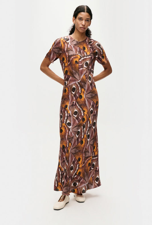 Image of a model wearing Tops. Productname: Silk Laundry Short Sleeve Bias Dress in Wingspan colour by brand - Silk Laundry