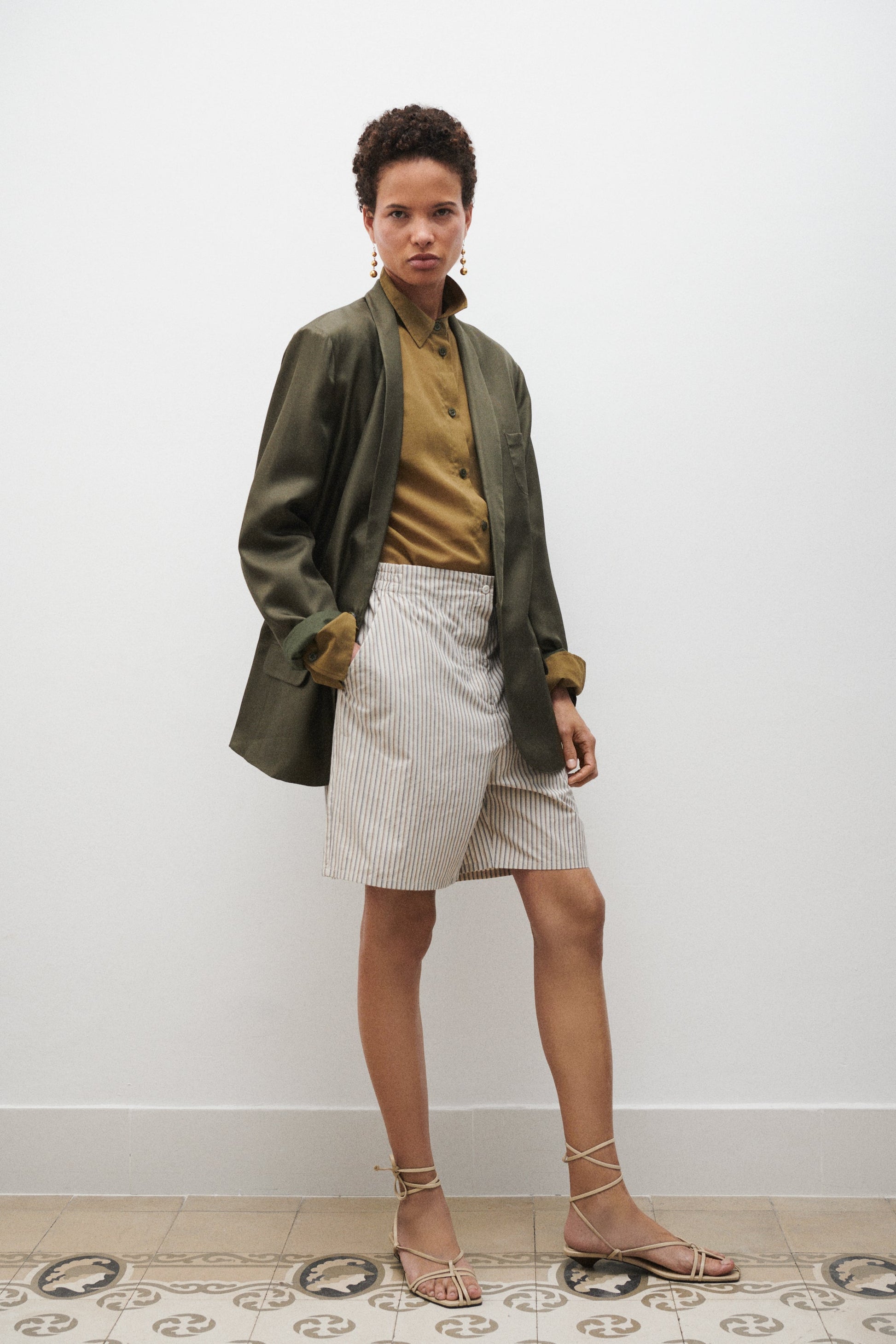 Image of a model wearing Shorts. Product name - Cotton Boxers Slate Stripe in Slate Stripe colour by brand - Silk Laundry