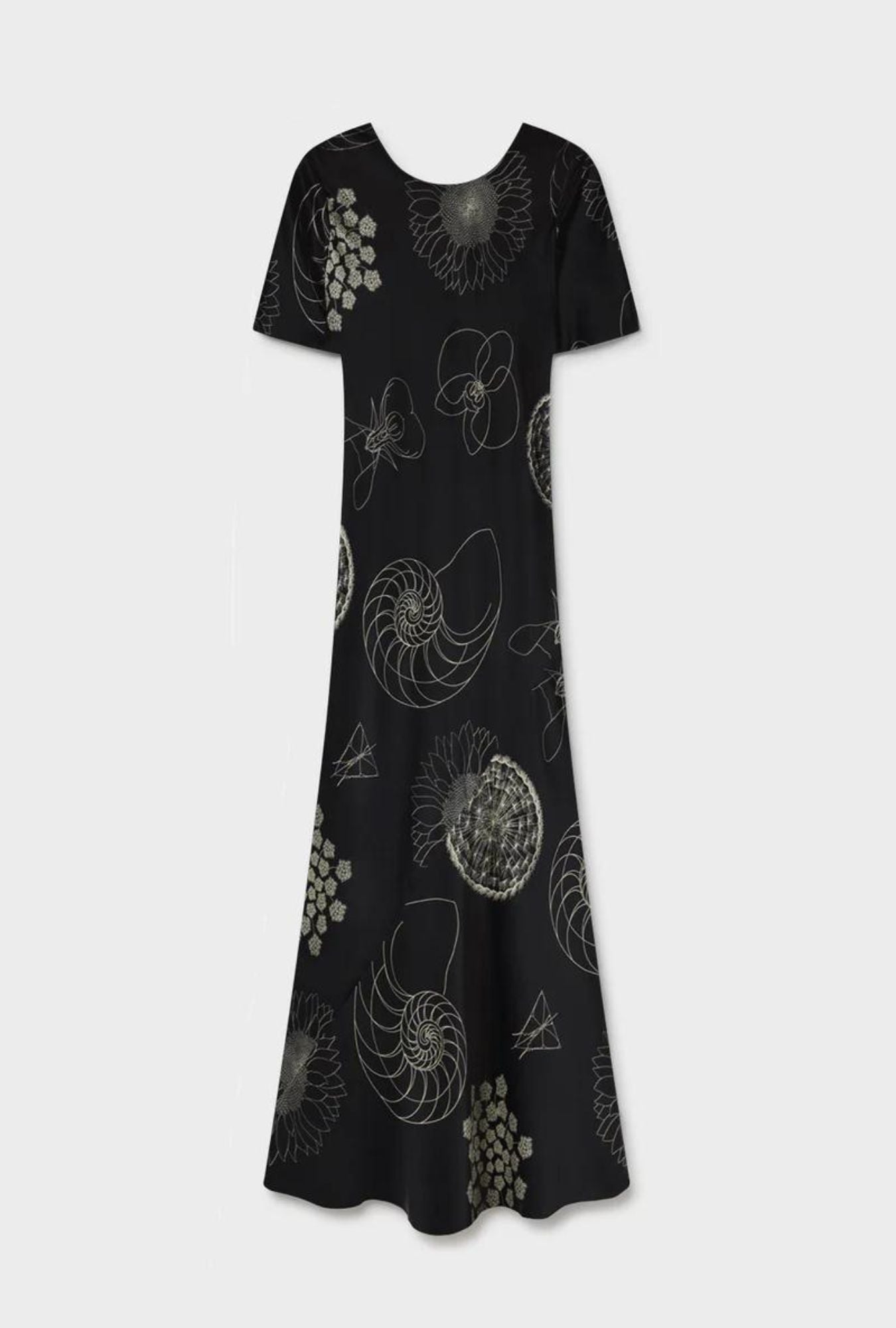 Image of a model wearing Tops. Product name - Short Sleeve Bias Dress Fibonacci Black in Fibonacci Black colour by brand - Silk Laundry