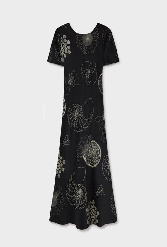 Image of a model wearing Tops. Product name - Short Sleeve Bias Dress Fibonacci Black in Fibonacci Black colour by brand - Silk Laundry