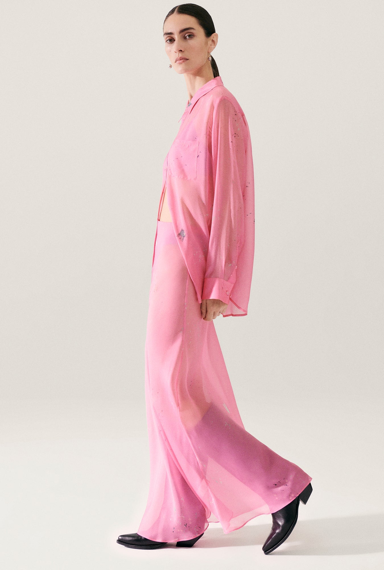 Image of a model wearing Skirts. Product name - Chiffon Long Bias Cut Skirt Hog Wash in Hog Wash colour by brand - Silk Laundry