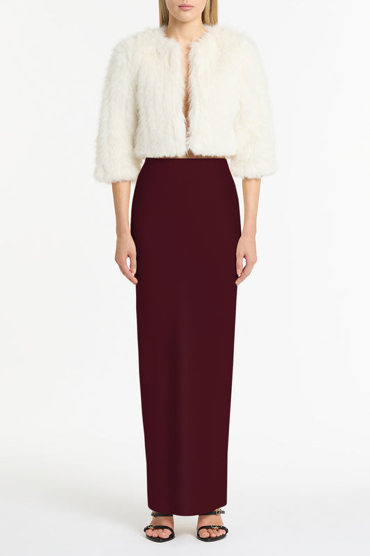 Image of a model wearing Skirts. Product name - Merlot Crepe Bias Skirt in Red colour by brand - Carla Zampatti