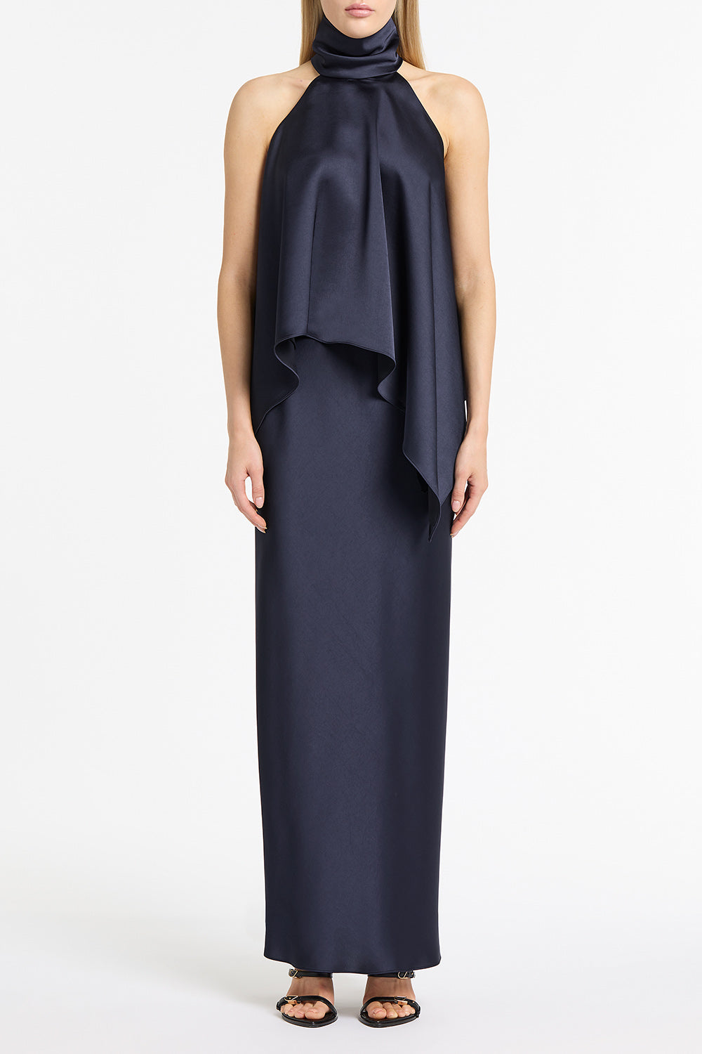 Image of a model wearing Tops. Product name - Midnight Satin Draped Halter Top in Blue colour by brand - Carla Zampatti