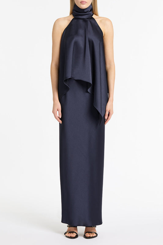 Image of a model wearing Tops. Product name - Midnight Satin Draped Halter Top in Blue colour by brand - Carla Zampatti