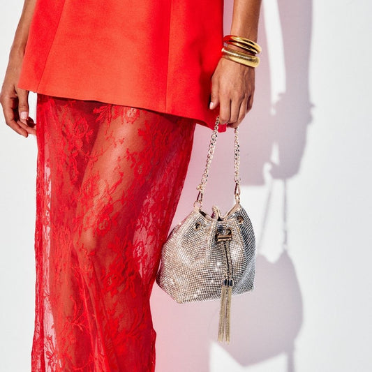 Image of a model wearing Pants. Productname: MIRANDA Drawstring Top Handle in colour by brand - Olga Berg