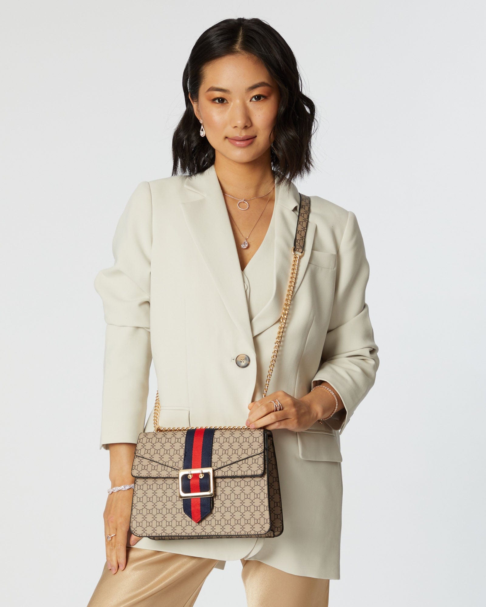 Image of Bags. Productname: Monogram Buckle Crossbody Bag in Monogram colour by brand - Colette by Colette Hayman