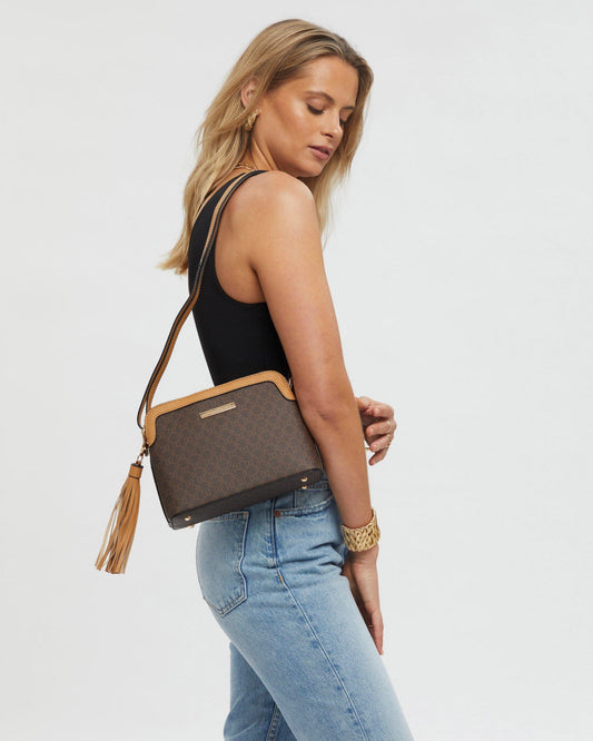 Image of Bags. Productname: Monogram Tassel Crossbody Bag in Monogram colour by brand - Colette by Colette Hayman