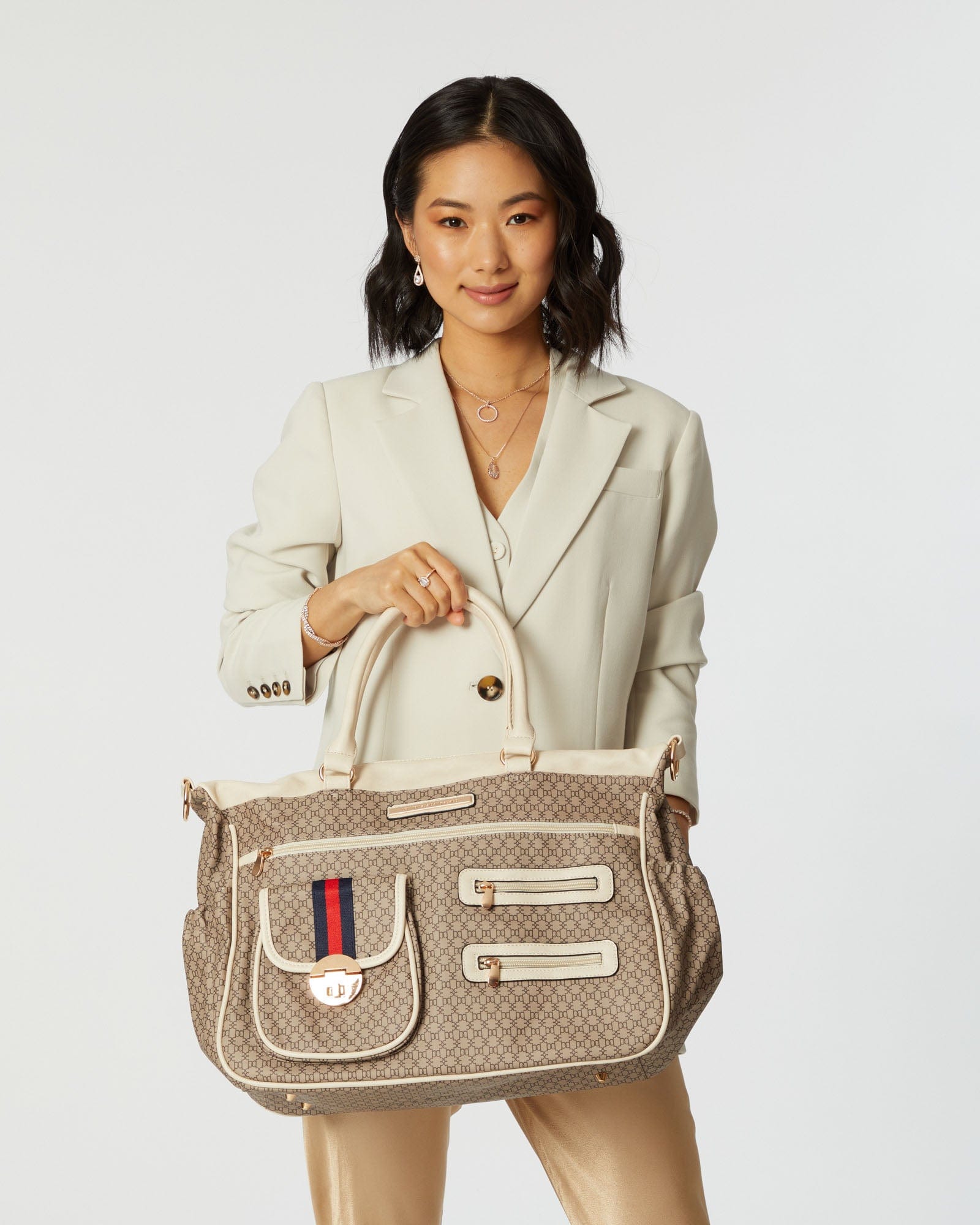 Image of Bags. Product name - Monogram Pocket And Zip Baby Bag in Monogram colour by brand - Colette by Colette Hayman