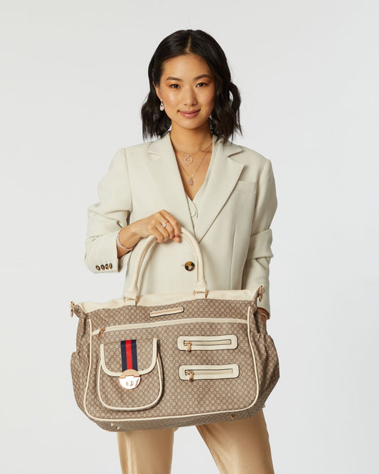 Image of Bags. Product name - Monogram Pocket And Zip Baby Bag in Monogram colour by brand - Colette by Colette Hayman