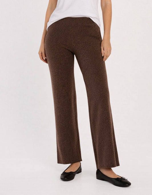 Image of a model wearing Pants. Productname: Nash Knit Pant - in Espresso Brown colour by brand - Betty Basics