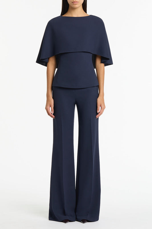 Image of a model wearing Tops. Product name - Navy Crepe Cape Top in Navy colour by brand - Carla Zampatti