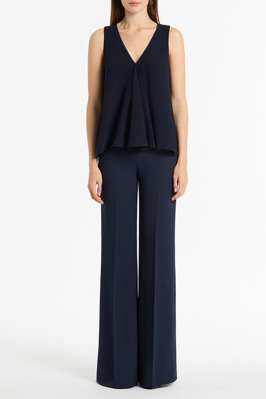 Image of a model wearing Tops. Product name - Navy Georgette Fluted Tank in Navy colour by brand - Carla Zampatti