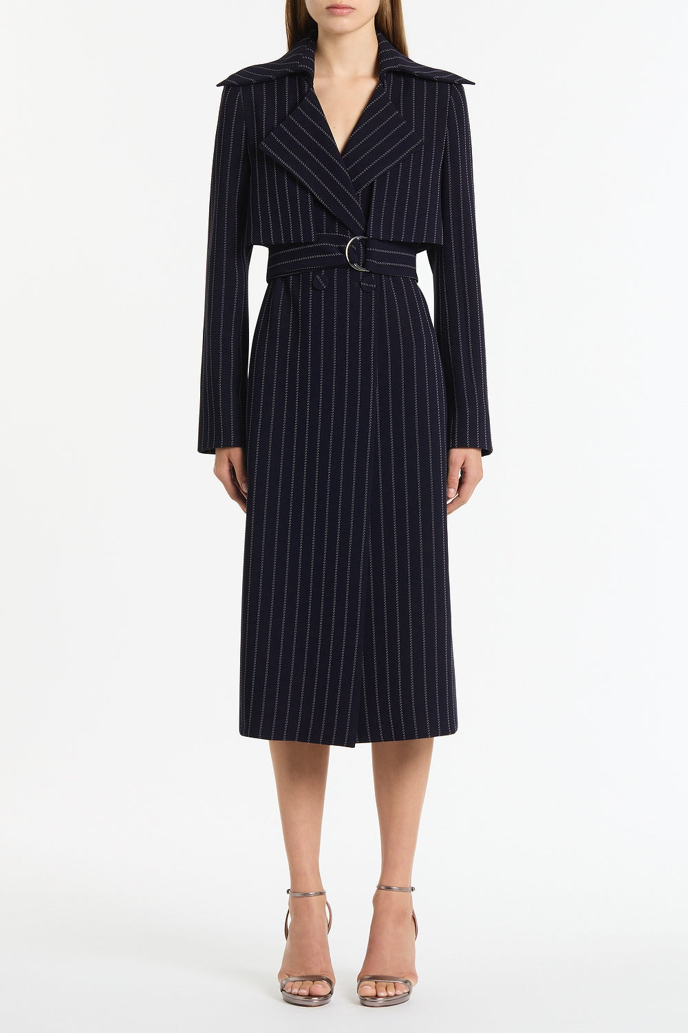 Image of a model wearing Outerwear. Product name - Navy Pinstripe Double-Breasted Trench Coat in Navy colour by brand - Carla Zampatti