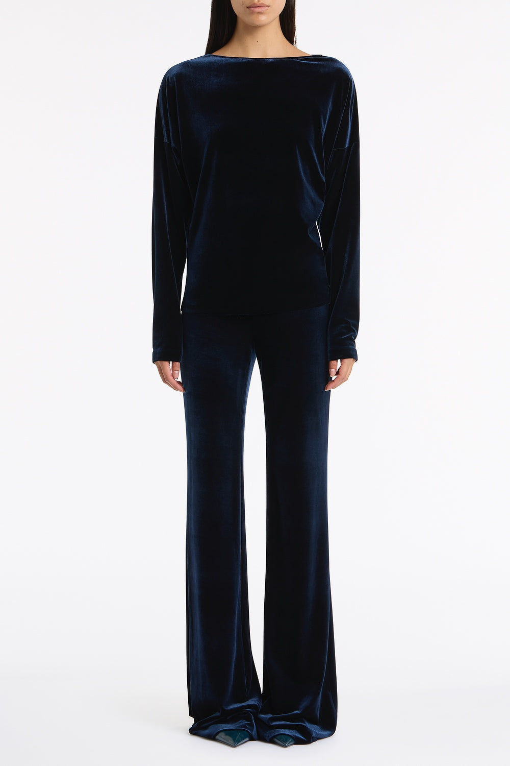 Image of a model wearing Tops. Product name - Navy Velvet Drop Shoulder Top in Navy colour by brand - Carla Zampatti