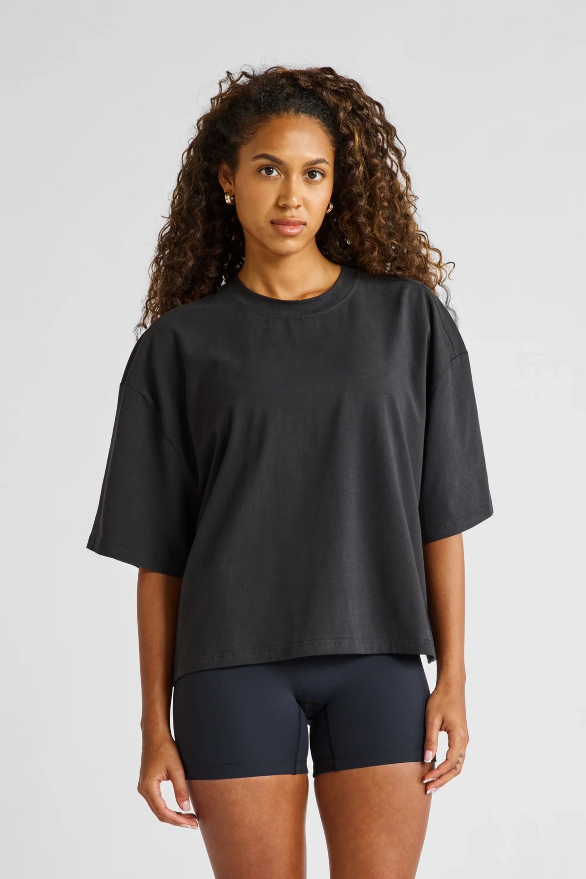 Image of T-Shirts. Product name - Oversized Cropped Tee in Black colour by brand - All Fenix
