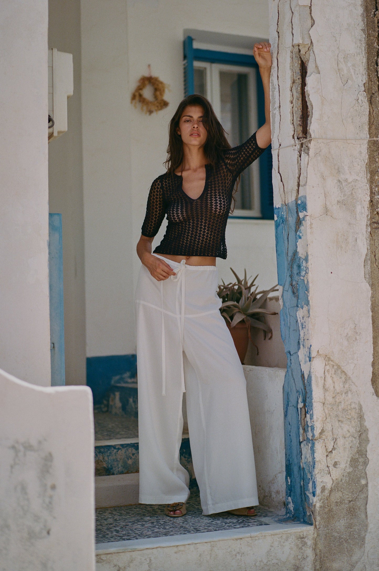 Image of a model wearing Pants. Product name - Norah Pants in White colour by brand - With Jéan
