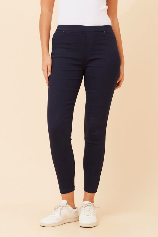 Image of a model wearing Pants. Product name - PRESLEY SKINNY PANTS in Navy colour by brand - Caroline Morgan Australia