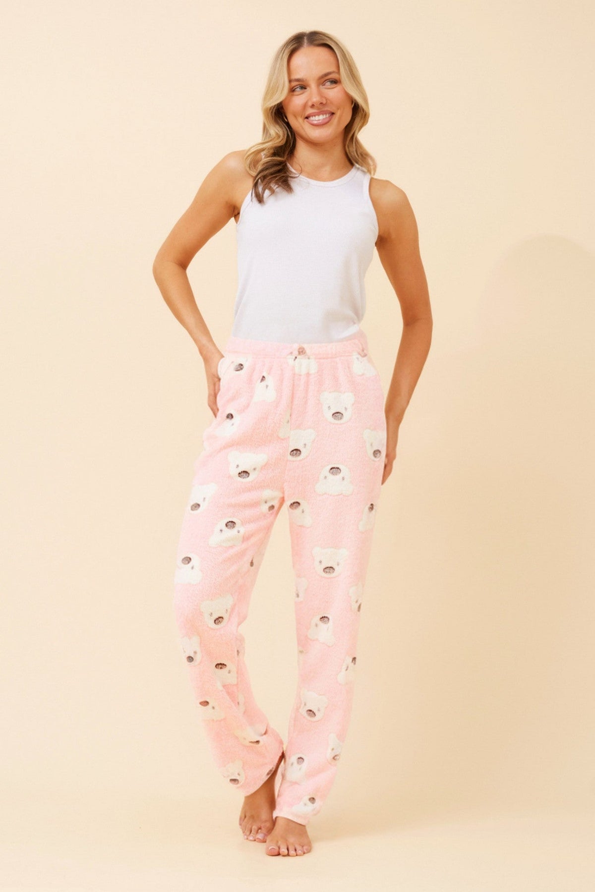 Image of a model wearing Pants. Product name - LEE TEDDY PRINT PLUSH PYJAMA PANTS in Light Blue colour by brand - Caroline Morgan Australia