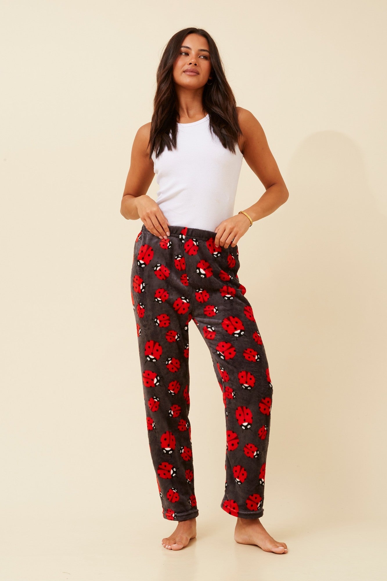 Image of a model wearing Pants. Product name - LEE PLUSH PYJAMA PANTS in Charcoal colour by brand - Caroline Morgan Australia