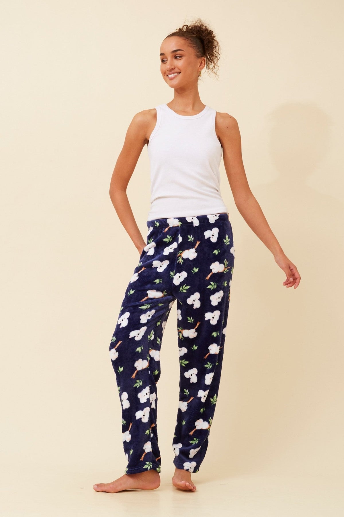Image of a model wearing Pants. Product name - LEE PYJAMA PANTS in Navy colour by brand - Caroline Morgan Australia
