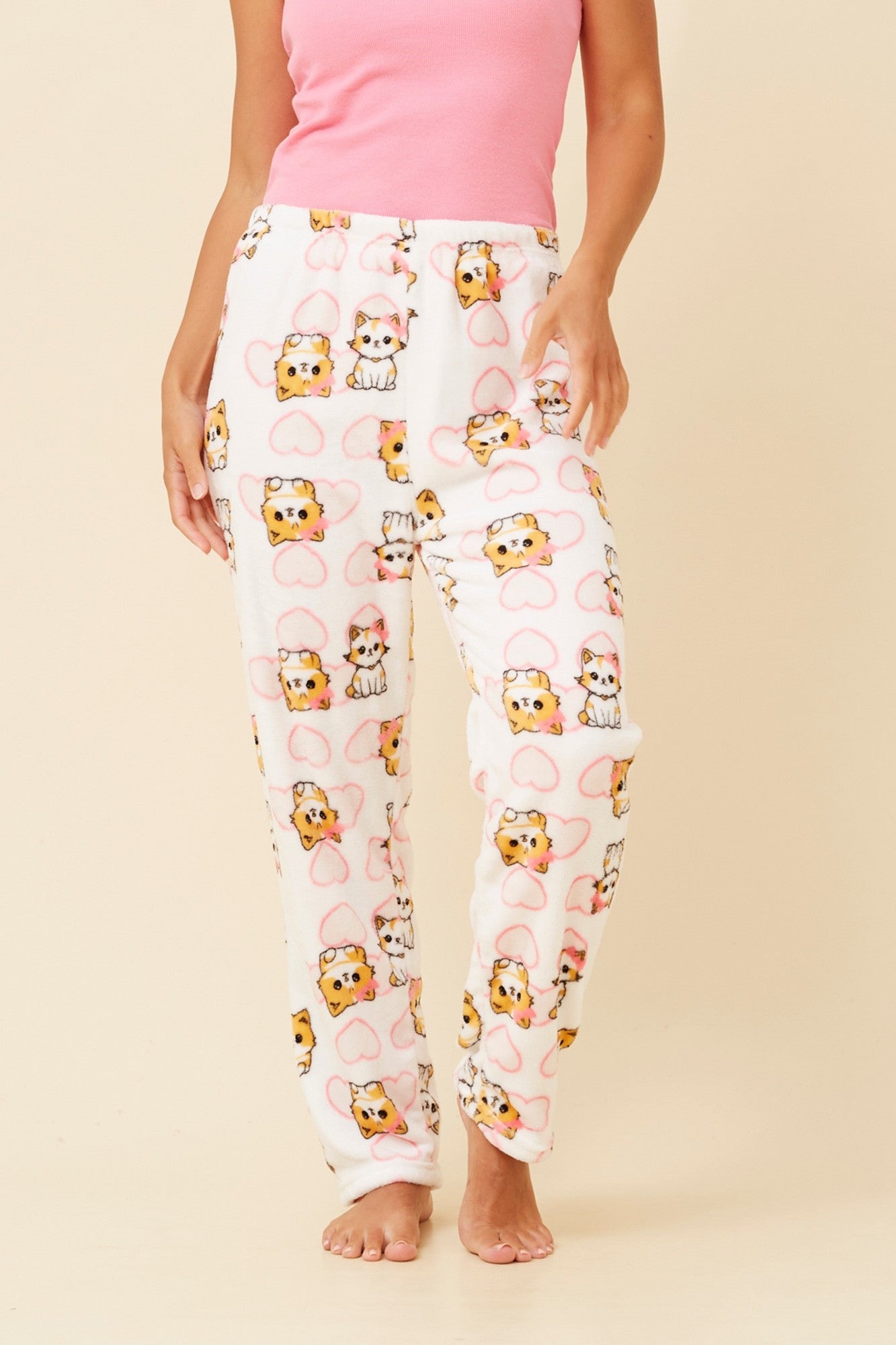 Image of a model wearing Pants. Product name - LEE CAT PRINT PLUSH PYJAMA PANTS in Multi Pink colour by brand - Caroline Morgan Australia
